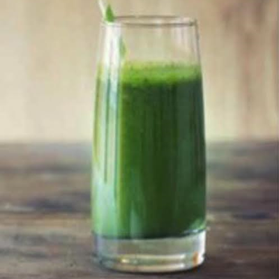 green smoothie and straw