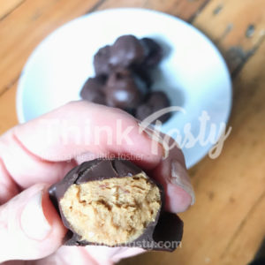 Sweet bite-sized balls of slightly salty peanut butter that are covered in chocolate. Plus, they're healthier than regular peanut butter balls!