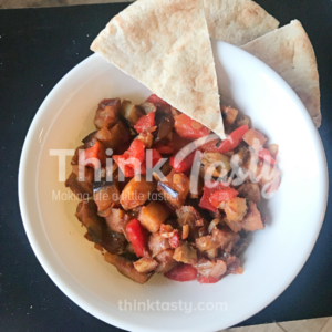 Eggplant, roasted peppers, garlic, and more coated with paprika make the perfect dip to serve with pita bread