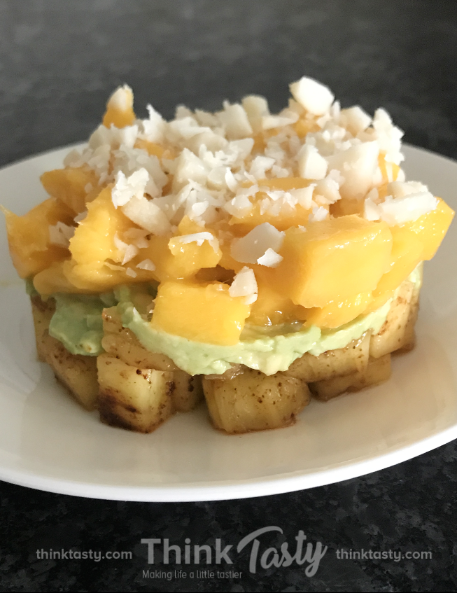 Spicy pineapple mashed avocado diced mango and chopped macadamia nuts