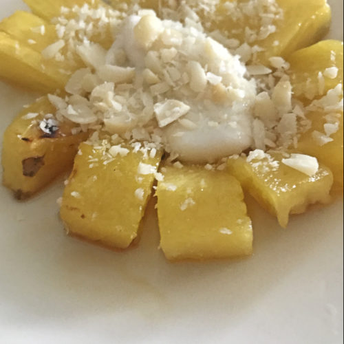 pineapple with yogurt and macadamia nuts