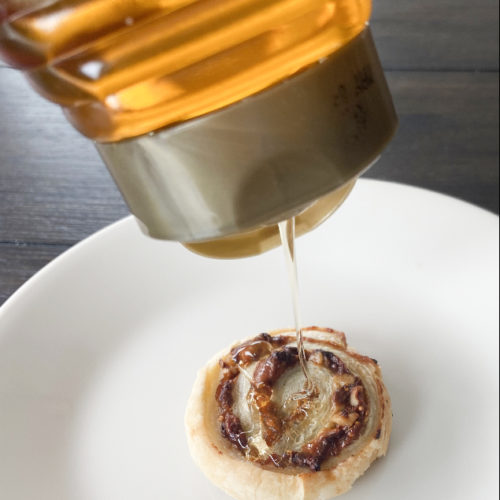 Puff pastry wrapped around fig jam, blue cheese, and walnuts