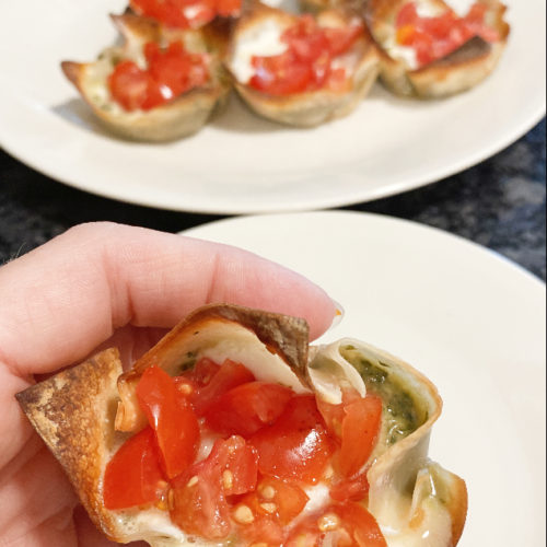 pesto mozzarella and tomato filled wonton cups