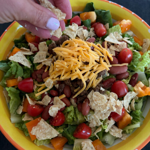 taco salad with tortilla chips and cheese