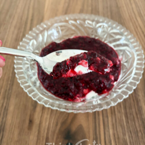 goat cheese dip topped with blackberry compote